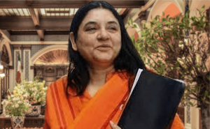 BJP MP Maneka Gandhi in orange cloth holding black file