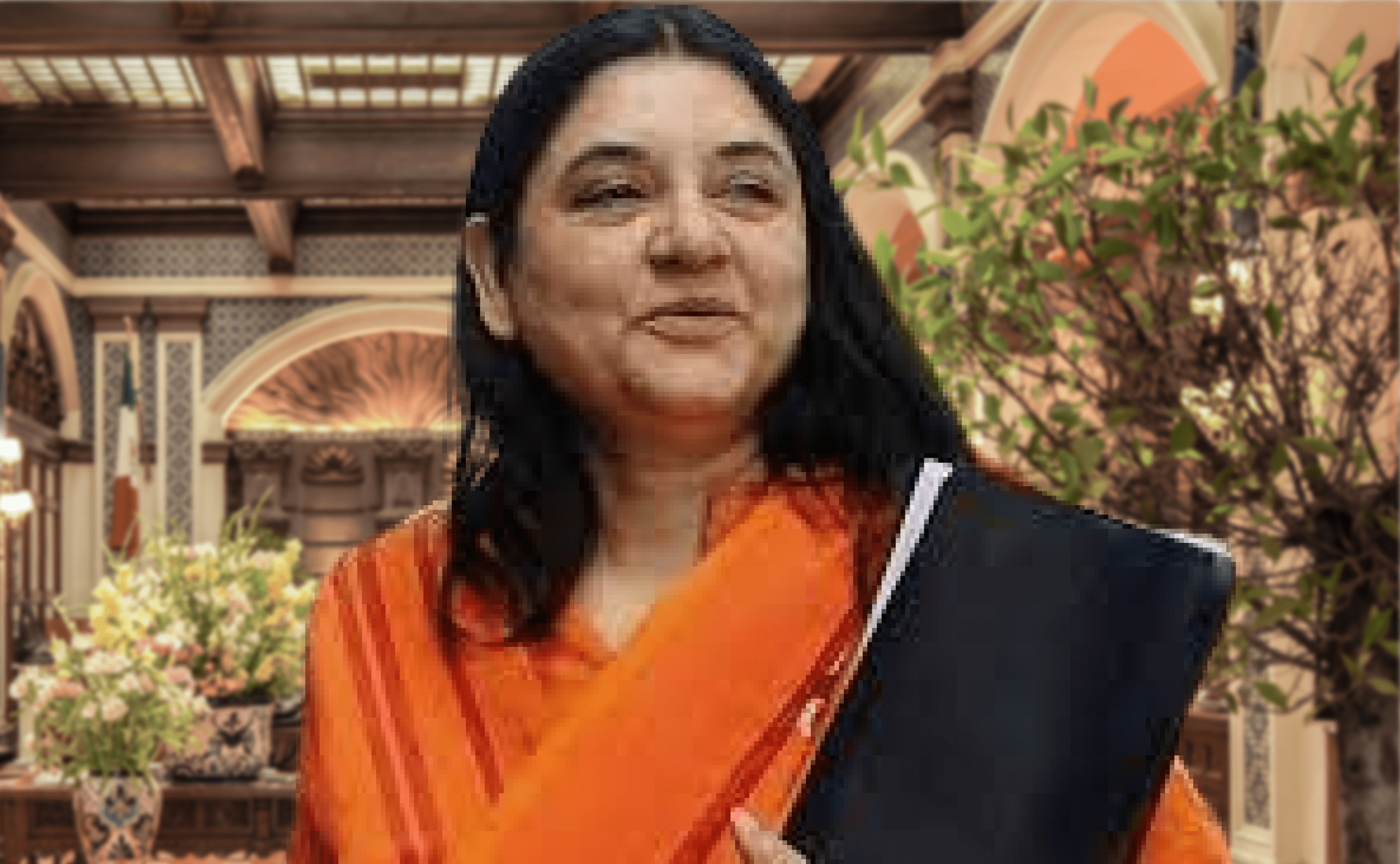 BJP MP Maneka Gandhi in orange cloth holding black file